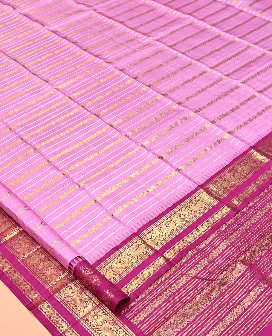 Pink Kanchipuram Designer Silk Saree, Majestically Detailed with Zari Stripes, Contrast Temple Border of Muthu, Banaras, Yaali, Mayil, and Jada Nagam, Geometric Pallu, and a Contrast Blouse