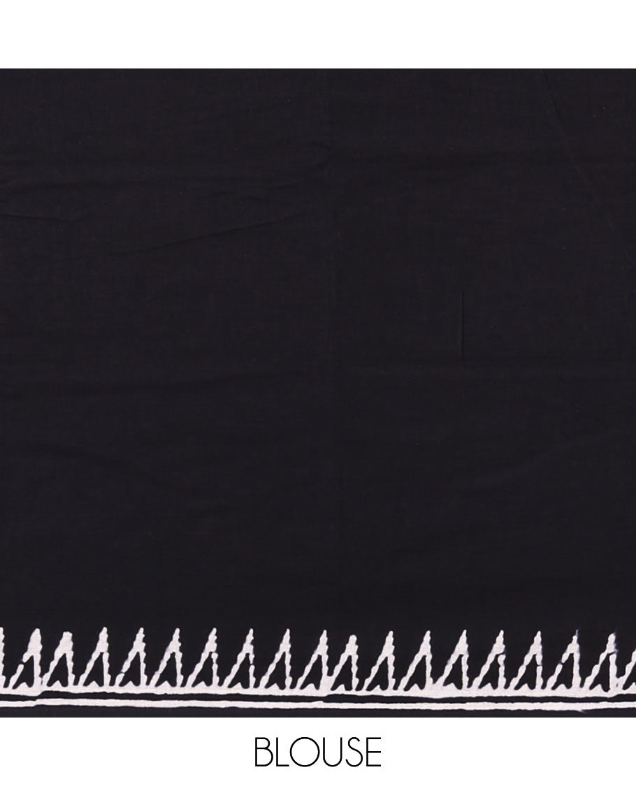 Black half-and-half style block printed soft mul cotton saree of camel and warli village print, temple border, geometric pallu, and a plain blouse