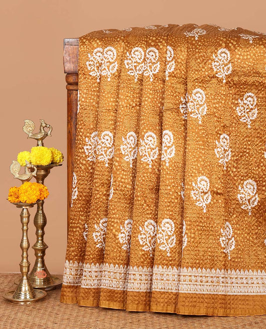 Gold floral printed litchi crushed saree, geometric printed border, floral-geometric printed pallu & triangle motif printed blouse
