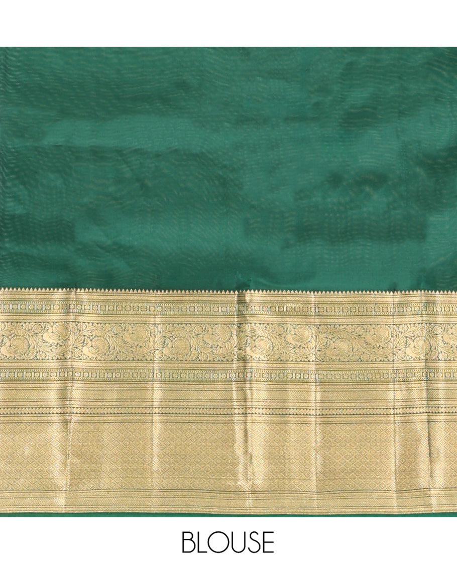 Green Vasundhara Lite Silk Mix Saree, Spotlighted with Zari Buttas On Its Body, Highlighted by Zari Border of Rekku, Kamalam, Mayil, and Jaal Designs, Intricate Pallu and Paired with a Matching Blouse