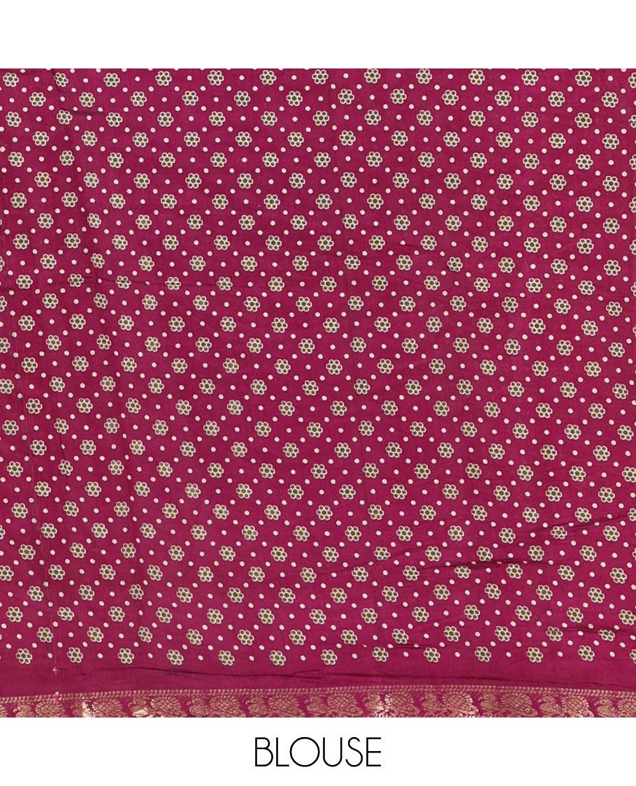 Green shibori printed muslin cotton saree, contrast zari border of elephant motifs print, big elephant printed pallu, and a contrast printed blouse