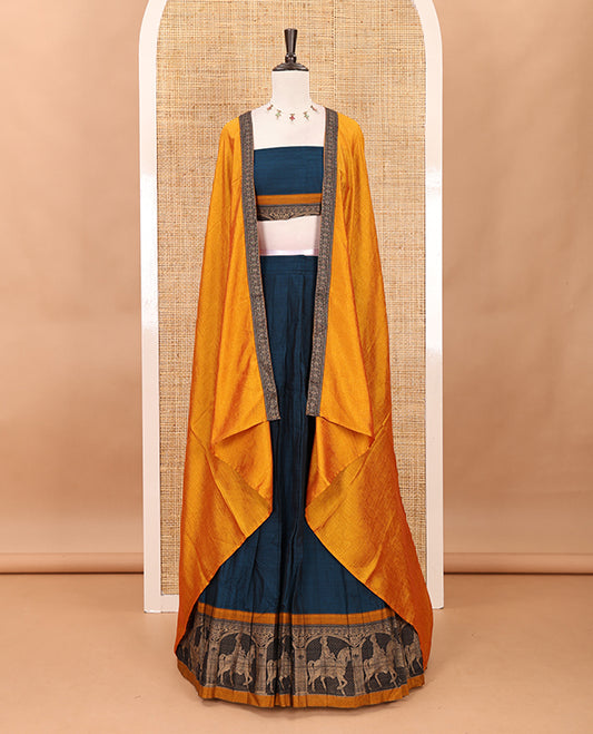 Blue with mustard mercedised cotton half-saree, contrast elephant zari border skirt, matching blouse & one side border georgette dhavani
