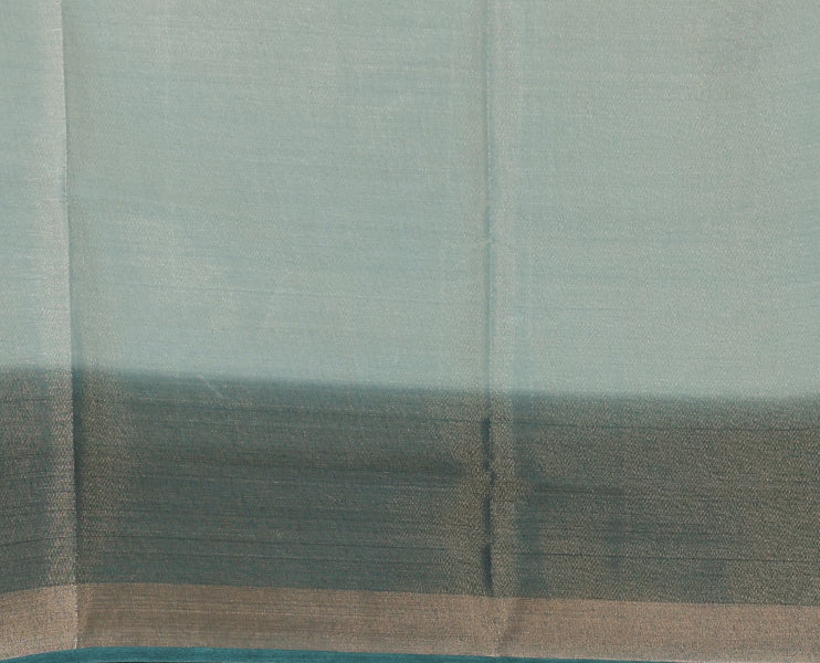 Green plain tissue saree, contrast gold zari piping border & self pallu with tussels