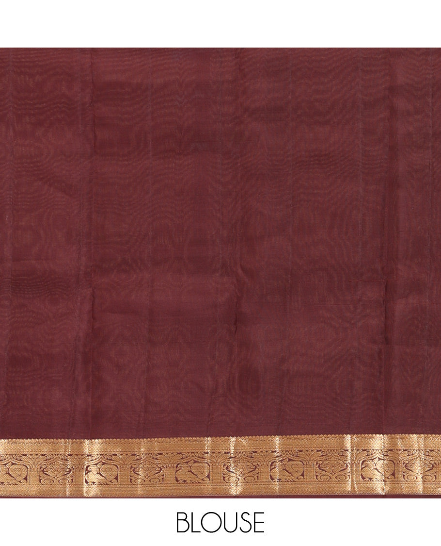 Brown Vasundhara Silk Saree, Enriched with Mayil-Chakram Buttas, a Zari Border of Rekku, Mayil Kann, and Mayil Designs, a Grand Pallu, and a Matching Blouse