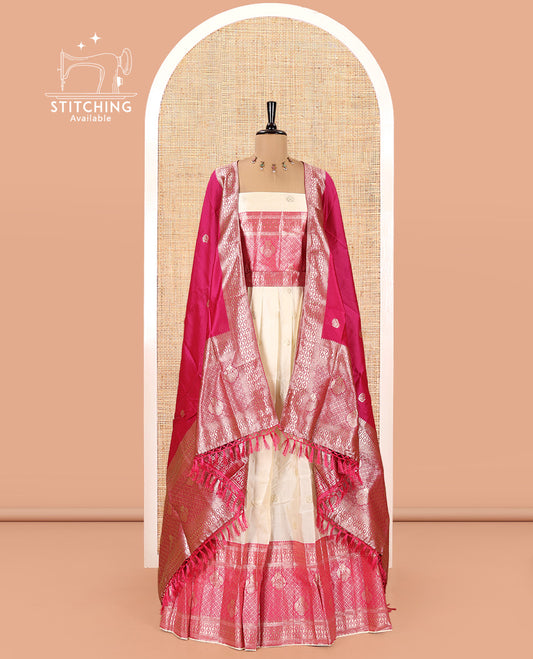 Cream-Rani Pink Semi-Banarasi Half-Saree Set Featuring Buttas Skirt, Contrast Traditional Border, a Matching Blouse, and a Banaras Dhavani