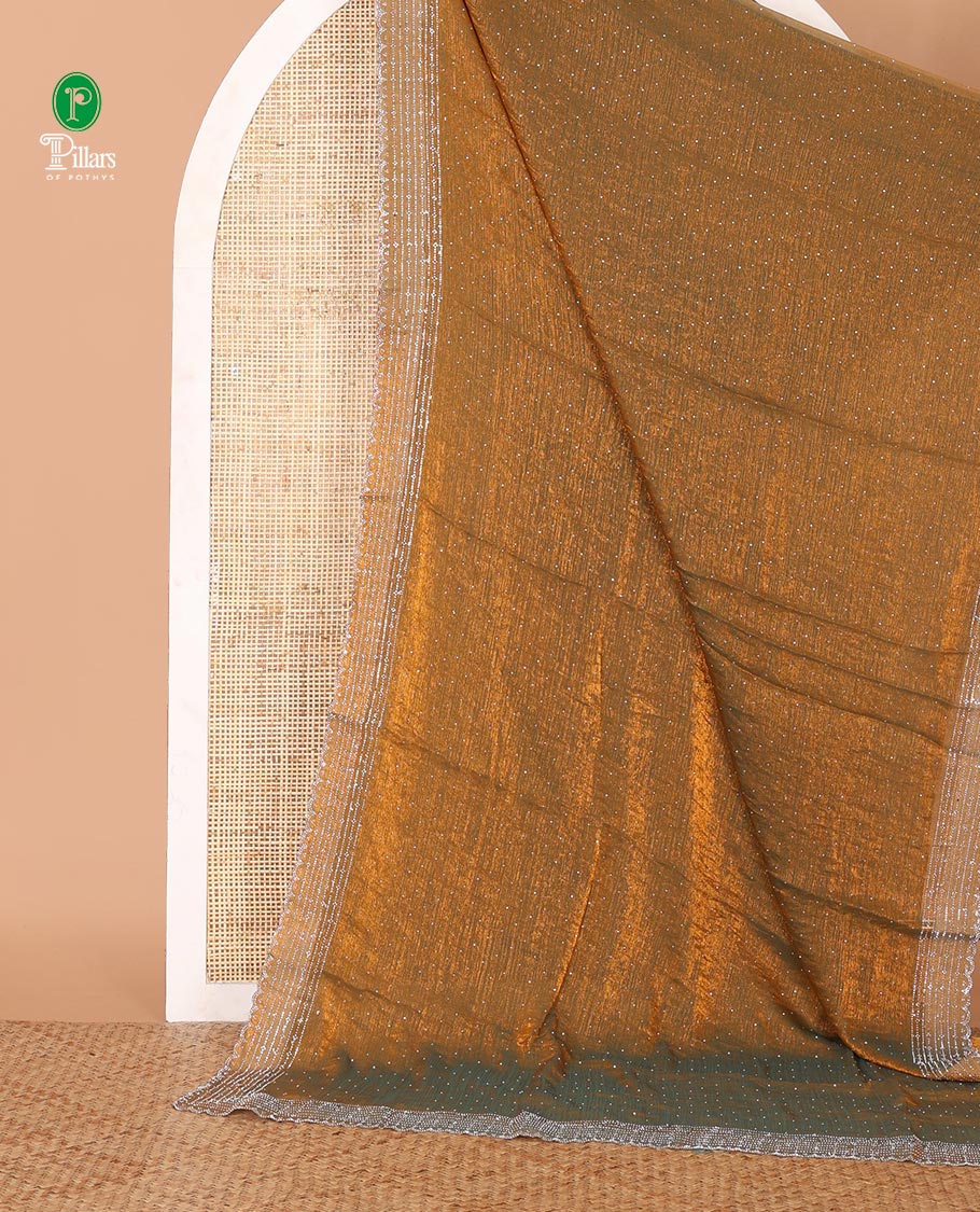 Mehendi green Swarovski crystal stonework Fendy chiffon saree,scallop stonework border & contrast purple stonework blouse