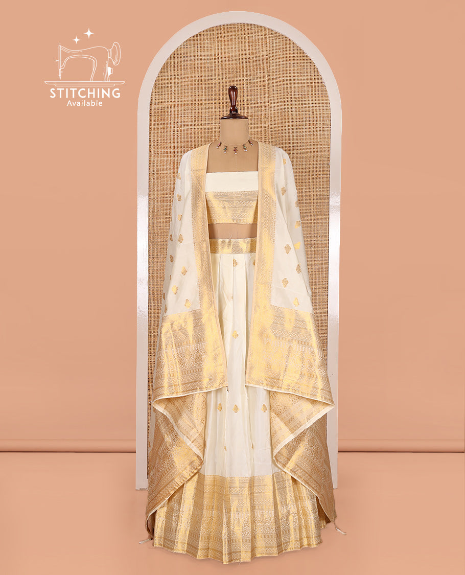 Cream Banarasi Silk Half-Saree Features Zari Buttas Skirt, a Traditional Border, Matching Blouse, and Zari-Woven Dhavani