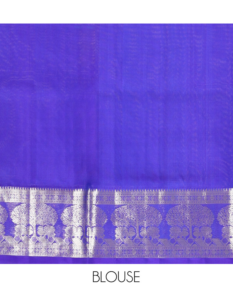 Green Venkatagiri Silk Saree, Enriched with Zari Buttas All Over Its Body, Complemented by a Contrast Traditional Zari Border of Tree Designs, Pallu Steeped with Leaf Designs, and Paired with a Contrast Blouse