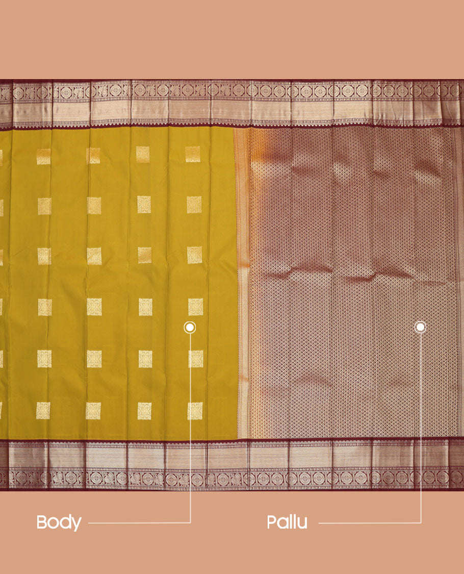 Green Budget Silk Saree, Detailed with Zari Buttas All Over Its Body, Complemented by a Contrast Traditional Zari Design Border of Peacock-Chakram Designs, Subtle Jaal Pallu, and Paired with a Contrast Blouse