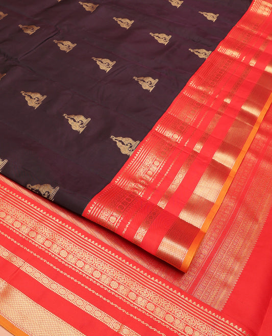 Brown Vasundhara Lite Silk Mix Saree, Delicately Woven with Yaanai Buttas, Complemented by Contrast Border of Rekku, Muthu, Jada Nagam, Laddu Kamalam, Mayil, Rudraksham, and Mayil Kann Designs, Grand Pallu and Paired with a Contrast Blouse