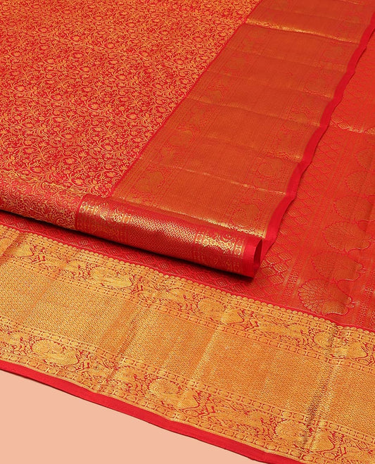 Red Samudrika Silk Saree, Beautifully Bedecked with Floral Jacquard Design on Its Body, Highlighted by a Zari Border of Salngai, Rudraksham, Mayil, Kuthirai, and Jaal Designs, Grand Jaal Pallu, and Paired with a Matching Blouse