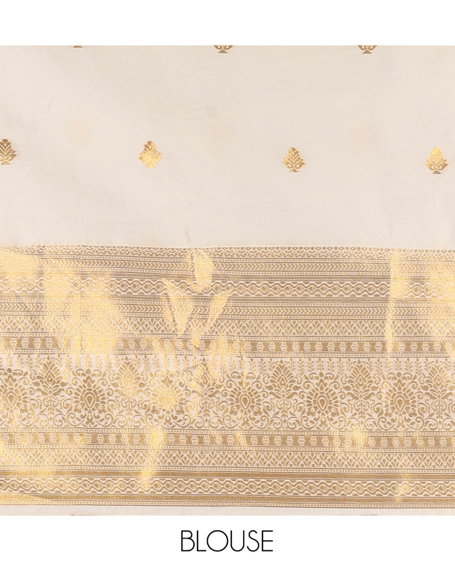 Cream Banarasi Silk Half-Saree Features Zari Buttas Skirt, a Traditional Border, Matching Blouse, and Zari-Woven Dhavani