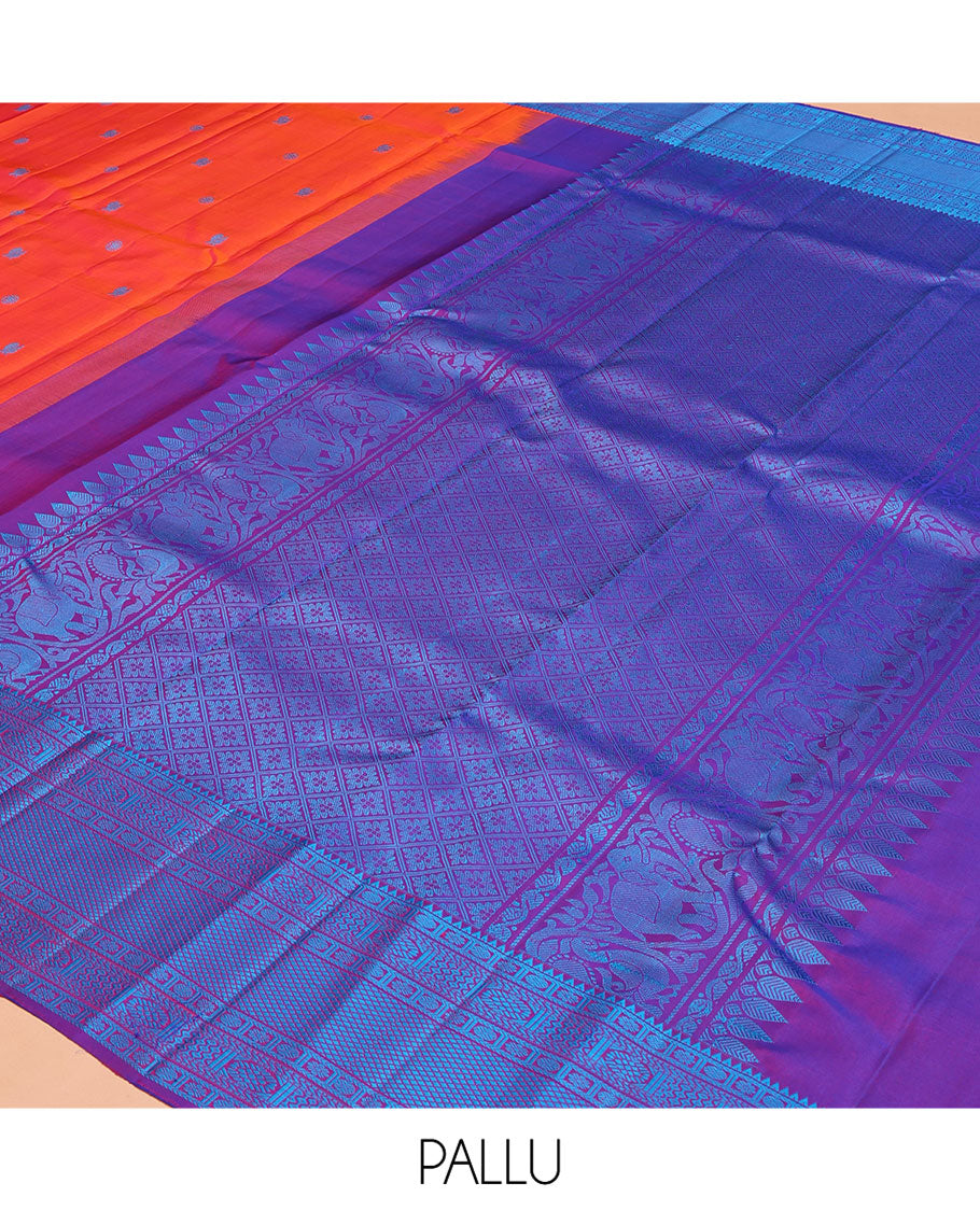 Orange Kanchipuram Silk Saree, Bedecked with Mayil and Chakram Thread Buttas on Its Body, Complemented by a Contrast Border of Rekku, Kamalam, Poun, Chakram, Kuyil Kann, and Then Kuli Kann Designs, Jaal Design Pallu, and Paired with a Contrast Blouse