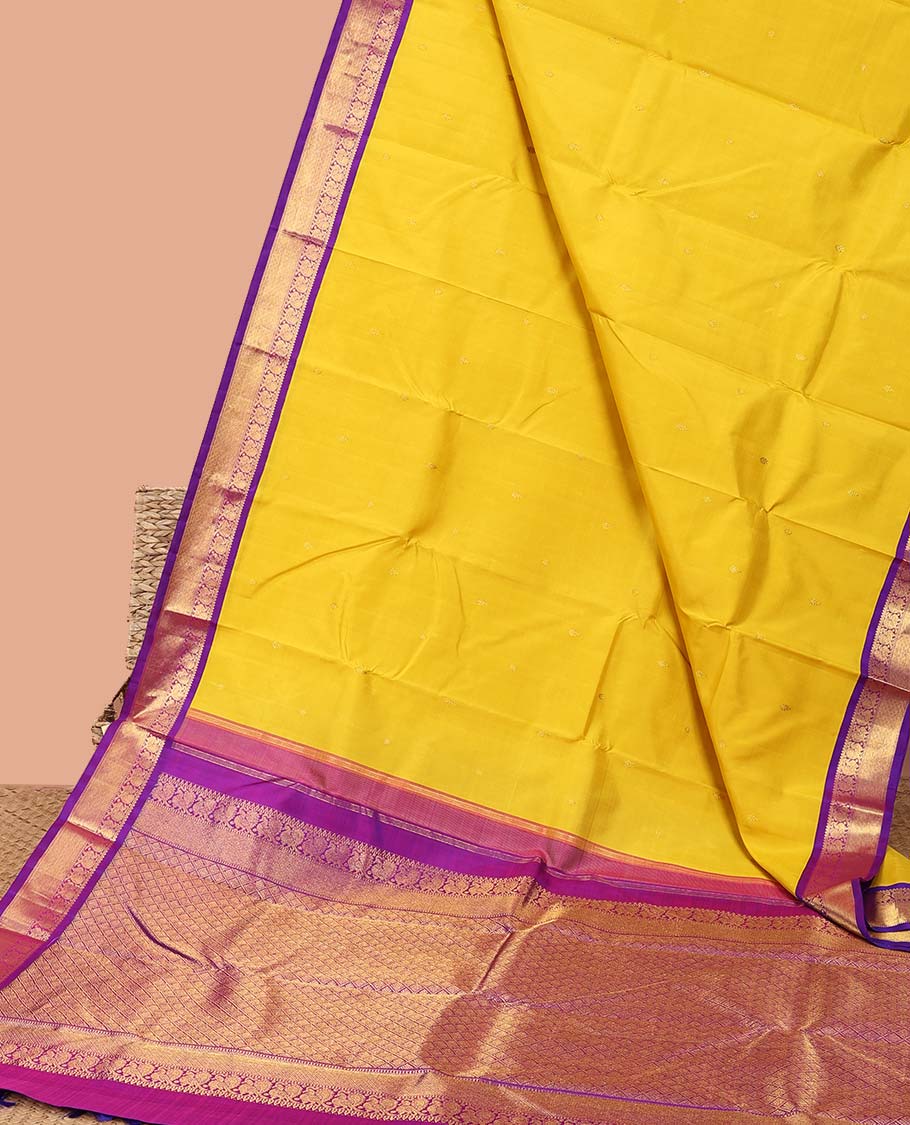 Yellow kancheepuram silk saree with intricate zari pallu & korvai border og rekku, muthu,mayil,mayil kann designs