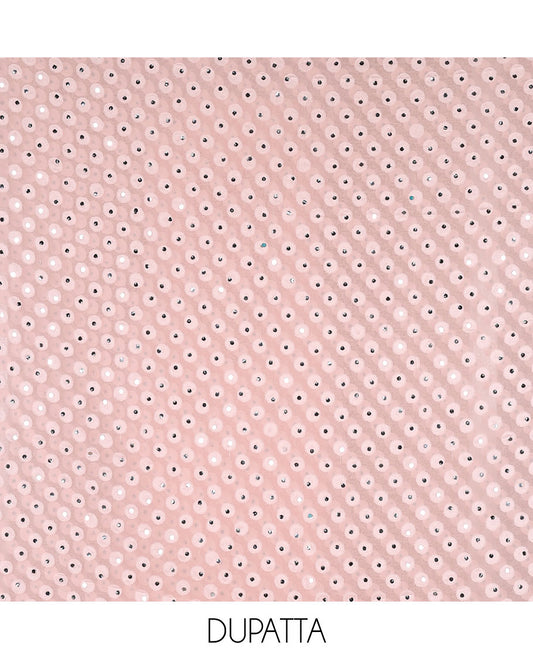 Peach material churidar set, stone work with Schiffli style embroidered georgette top, American Crape bottom, and polka dotted printed mirror work dupatta