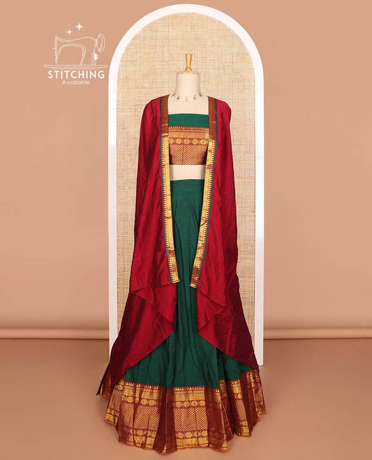 Green mercerised cotton daman resham border half saree with mercerised cotton blouse & skya georgette one side resam border work