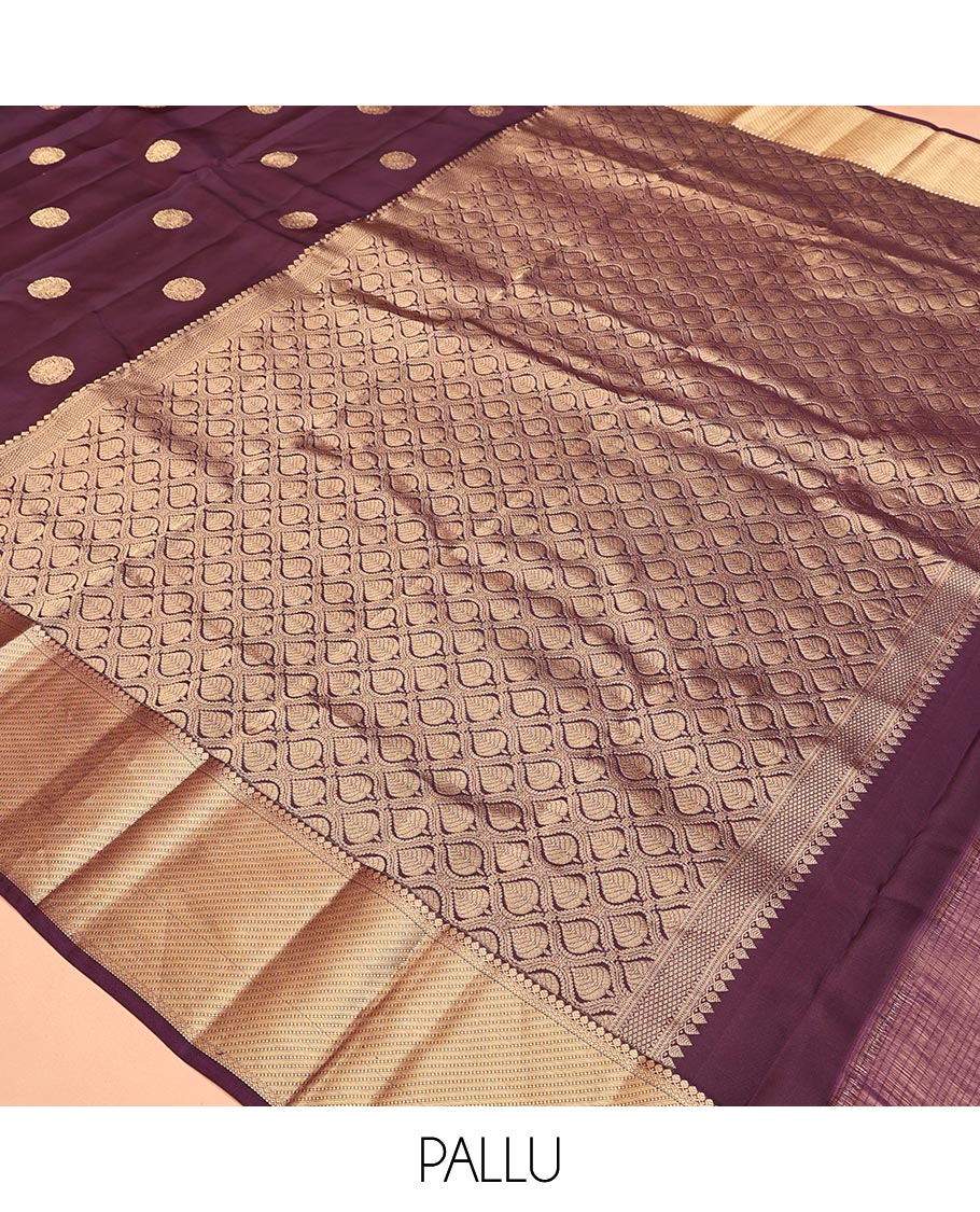 Brown Vasundhara Lite Silk Mix Saree, Detailed with Zari Buttas All Over Its Body, Highlighted by a Zari Border of Thilakam Mokku, Neli, and Muthu Designs, Ogee-Patterned Pallu, and Paired with a Matching Blouse
