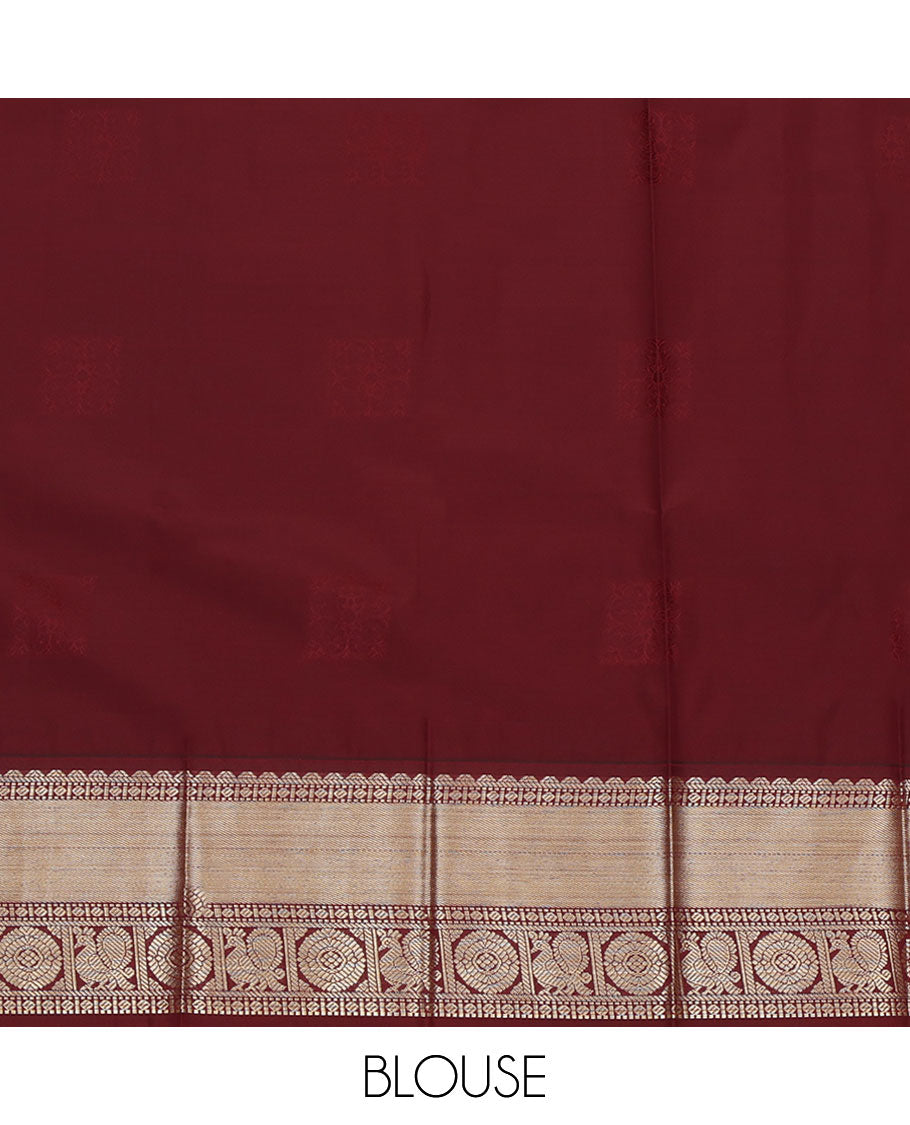 Green Budget Silk Saree, Detailed with Zari Buttas All Over Its Body, Complemented by a Contrast Traditional Zari Design Border of Peacock-Chakram Designs, Subtle Jaal Pallu, and Paired with a Contrast Blouse