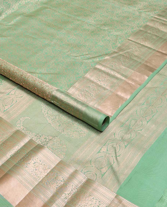 Green floral design kancheepuram silk saree with self border of  intricate zari design border & floral design pallu