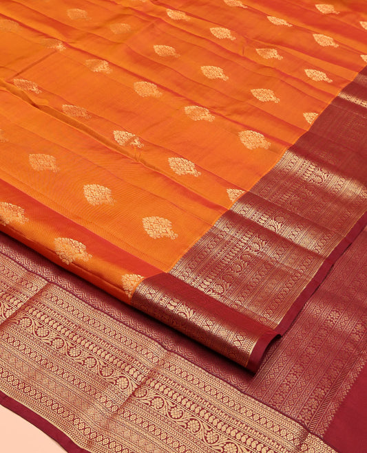 Orange Vasundhara Silk Mix Saree, Entralled with Zari Buttas All Over Its Body, Complemented by Contrast Border of Lavangam, Kathir, Laddu Kamalam, Neli, Manga, and Kodi Visiry Designs, Grand Pallu and Paired with a Contrast Blouse