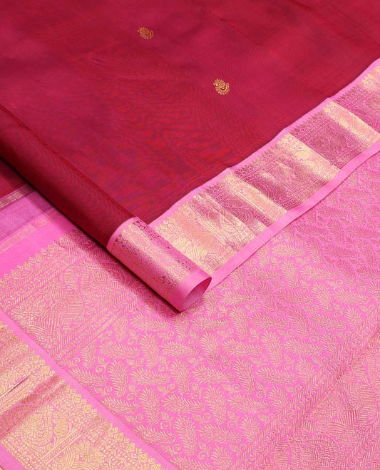 Red zari buttas Kanchipuram korvai silk saree, contrast neer korvai border of thilakam mokku, muthu, rettai neli, and mayil designs, and zari design pallu