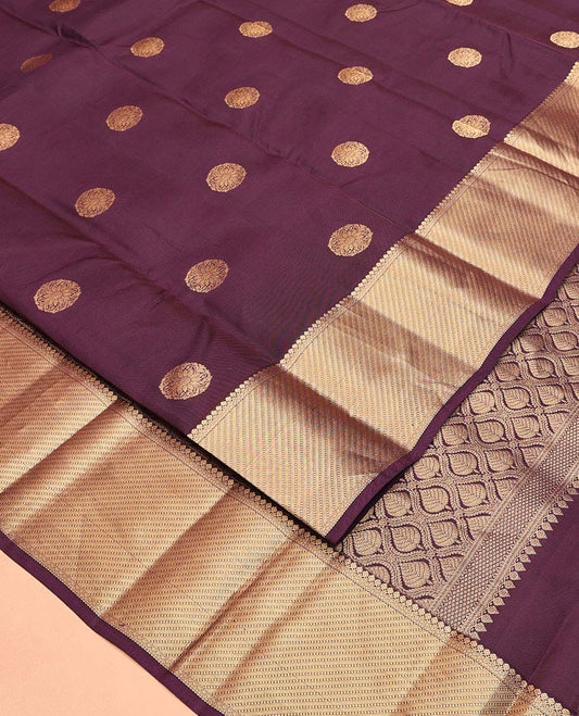 Brown Vasundhara Lite Silk Mix Saree, Detailed with Zari Buttas All Over Its Body, Highlighted by a Zari Border of Thilakam Mokku, Neli, and Muthu Designs, Ogee-Patterned Pallu, and Paired with a Matching Blouse