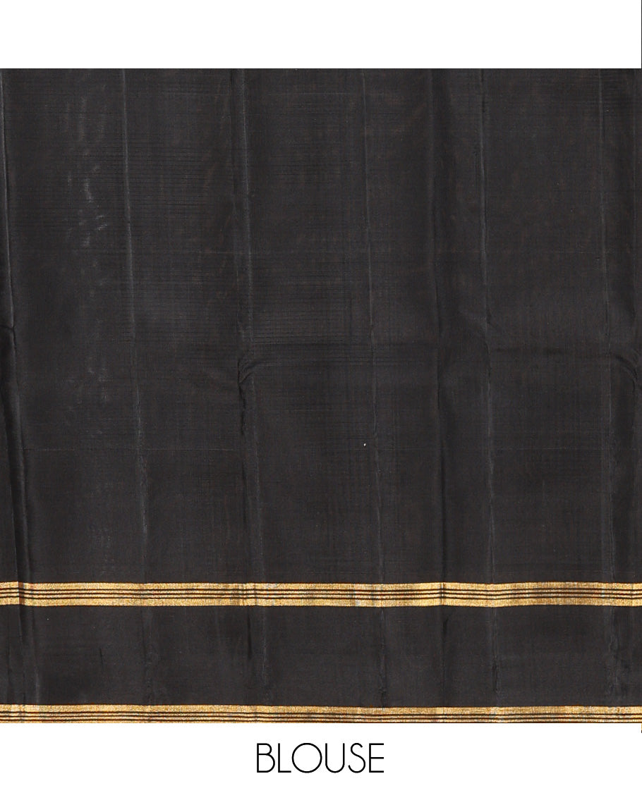 Green micro-checked Kanchipuram silk saree, contrast thazampoo rekku border, and zari striped pallu