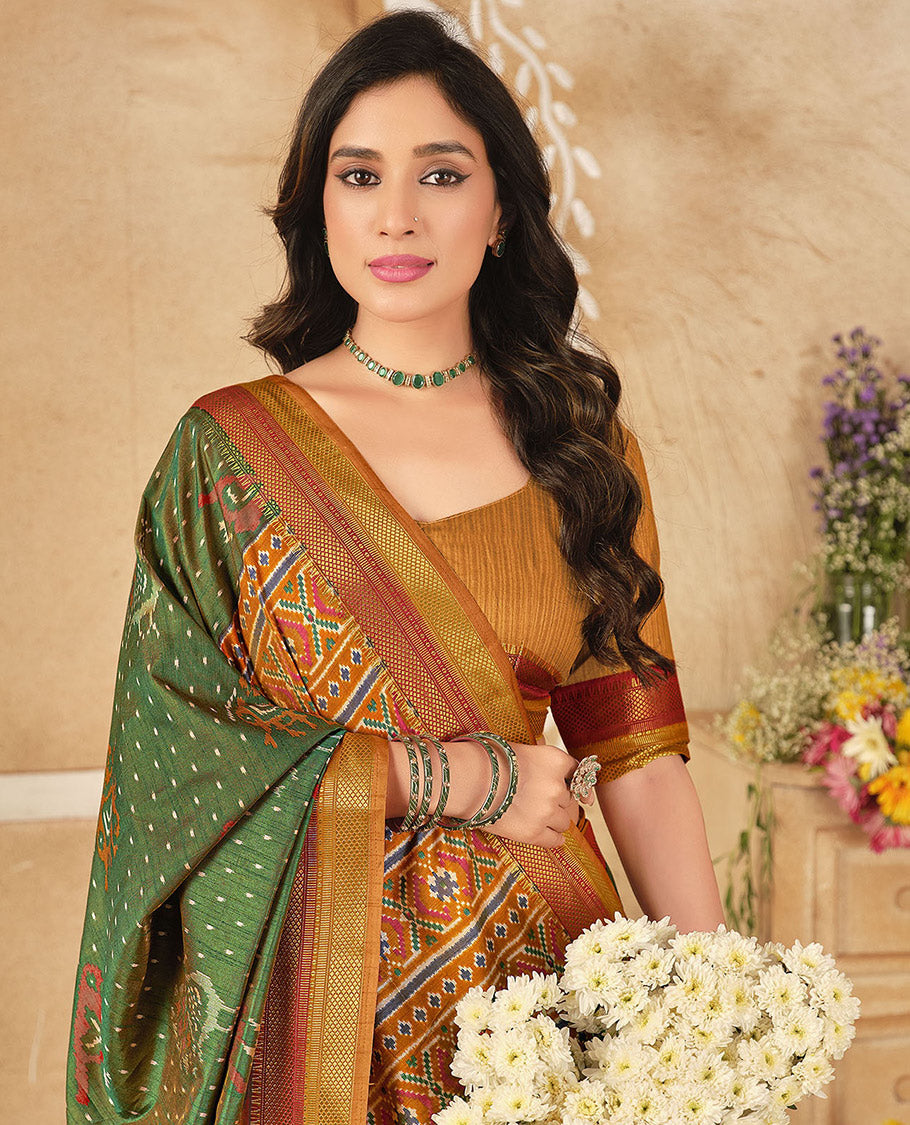 Green Fancy Raw Silk Designer Saree, Enthralled with Ikat Butta and Bird Buttas, a Contrast Traditional Border, a Patola-Printed Pallu, and a Contrast Blouse