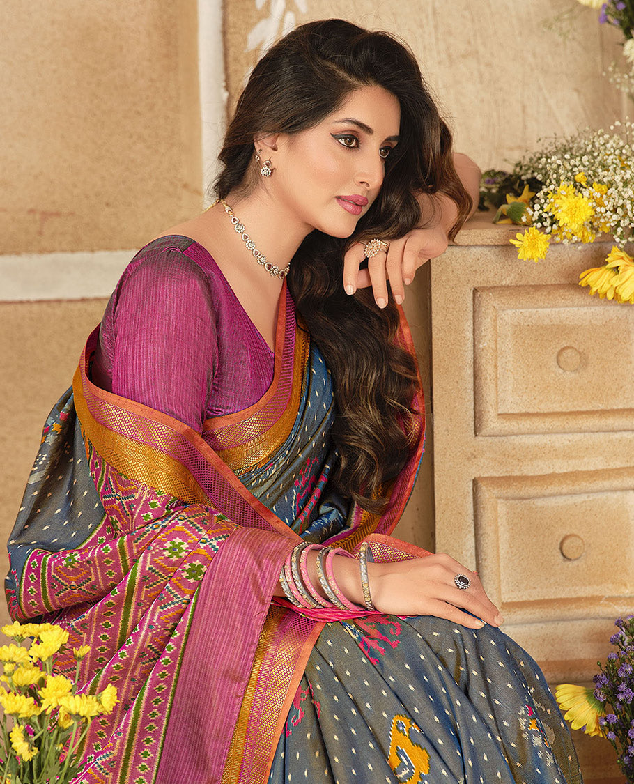 Grey Fancy Raw Silk Designer Saree, Detailed with Ikat Butta and Bird Buttas, a Contrast Traditional Border, a Patola-Printed Pallu, and a Contrast Blouse