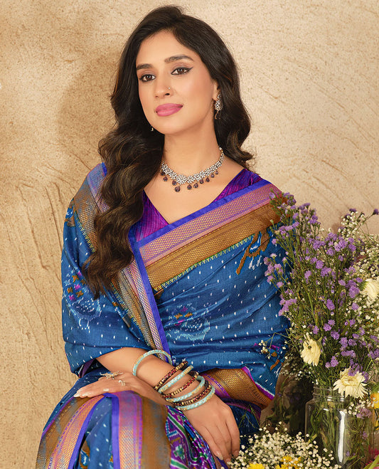 Blue Fancy Raw Silk Designer Saree, Adorned with Ikat Butta and Bird Buttas, a Contrast Traditional Border, a Patola-Printed Pallu, and a Contrast Blouse