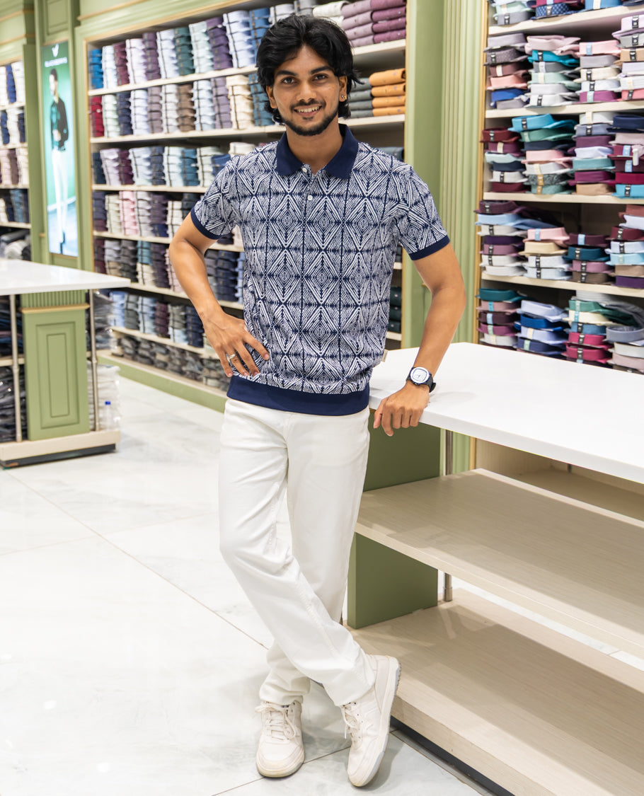 Black  Cotton-Blended Polo Neck T-Shirt Features Argyle Print, Half Sleeves, a Slim Fit, and Regular Length
