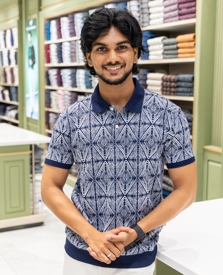 Black  Cotton-Blended Polo Neck T-Shirt Features Argyle Print, Half Sleeves, a Slim Fit, and Regular Length