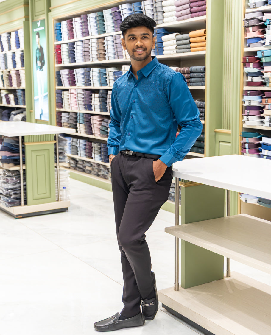 Peacock Blue Poly Satin Party Wear Shirt Features Micro-Stonework, Full Sleeves, a Slim Fit, a Spread Collar, and Regular Length