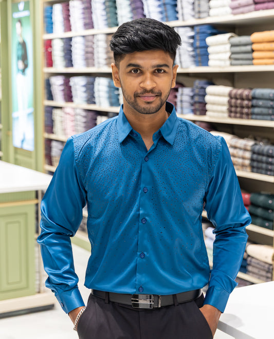 Peacock Blue Poly Satin Party Wear Shirt Features Micro-Stonework, Full Sleeves, a Slim Fit, a Spread Collar, and Regular Length