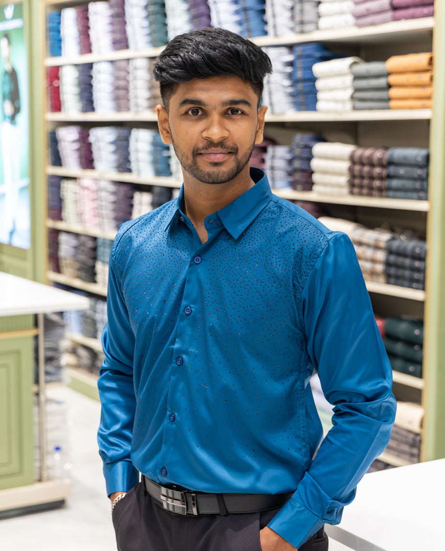 Peacock Blue Poly Satin Party Wear Shirt Features Micro-Stonework, Full Sleeves, a Slim Fit, a Spread Collar, and Regular Length