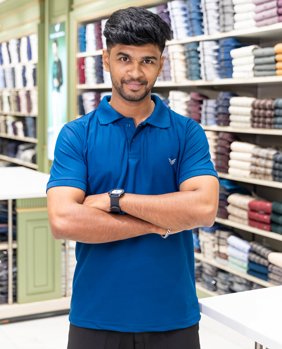 Blue Plain Cotton-Blended Polo T-Shirt Comes with Half Sleeves, a Slim Fit, Cuban Collar, and Regular Length