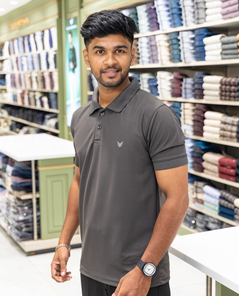 Black Plain Cotton-Blended Polo T-Shirt Comes with Half Sleeves, a Slim Fit, Cuban Collar, and Regular Length