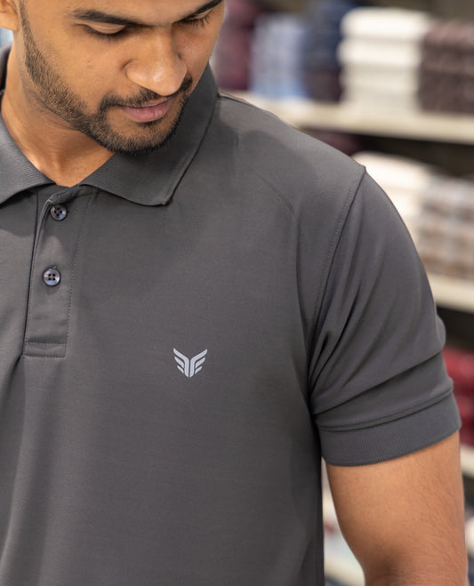 Black Plain Cotton-Blended Polo T-Shirt Comes with Half Sleeves, a Slim Fit, Cuban Collar, and Regular Length