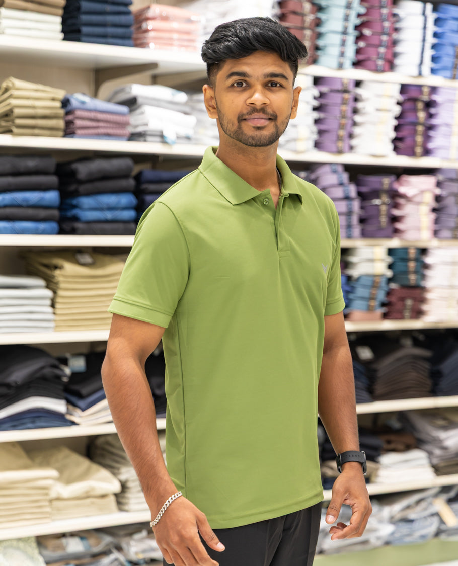 Green Plain Cotton-Blended Polo T-Shirt Comes with Half Sleeves, a Slim Fit, Cuban Collar, and Regular Length