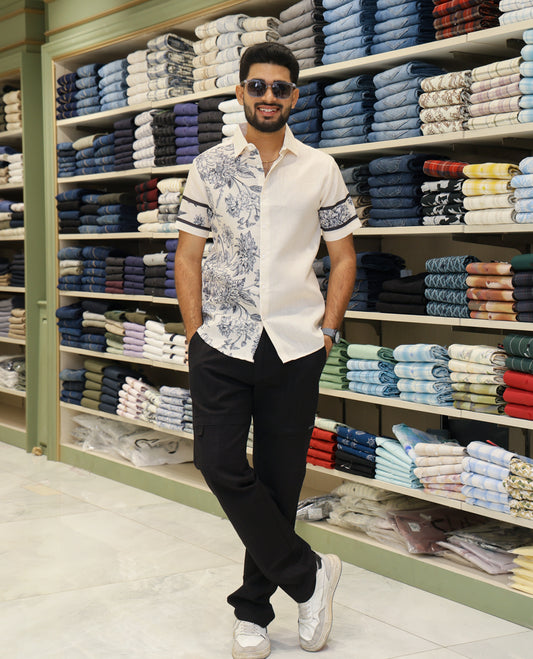 Cream Cotton-Blended Casual Shirt Features Half-and-Half Floral Print, Half-Sleeves, a Spread Collar, Regular Fit and Regular Length 