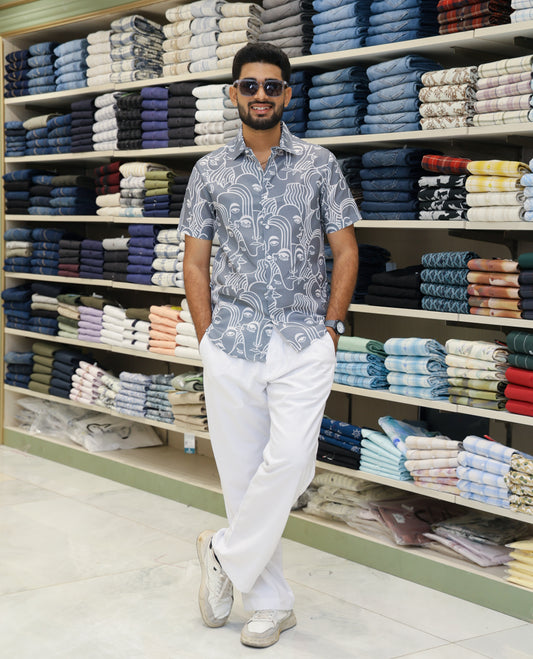 Grey Cotton-Blended Casual Shirt Features Human Faces Print, Half-Sleeves, a Spread Collar, Regular Fit and Regular Length 