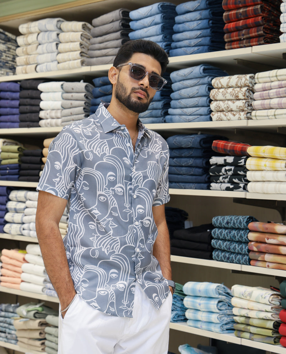 Grey Cotton-Blended Casual Shirt Features Human Faces Print, Half-Sleeves, a Spread Collar, Regular Fit and Regular Length 