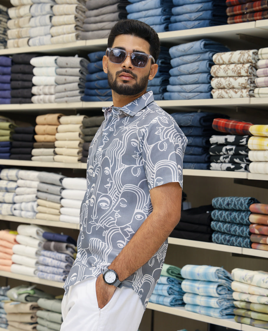 Grey Cotton-Blended Casual Shirt Features Human Faces Print, Half-Sleeves, a Spread Collar, Regular Fit and Regular Length 