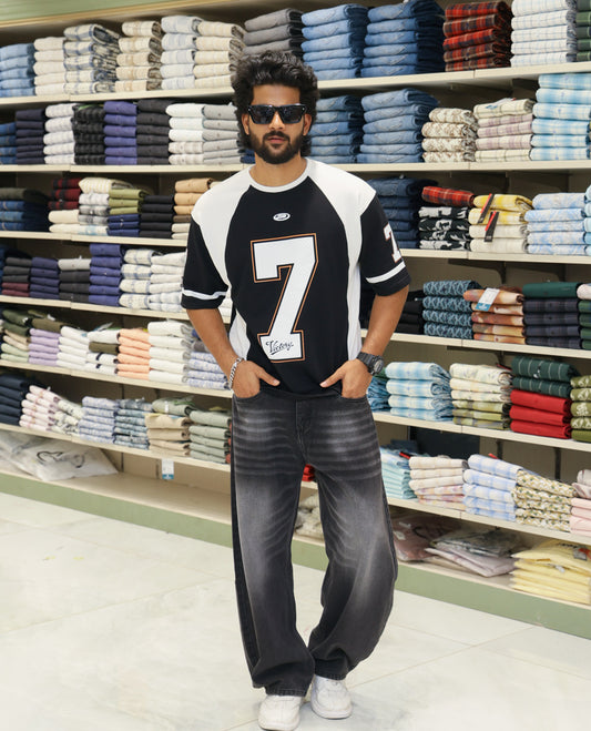 Black Cotton-Blended Oversized Printed Jersey-Style T-shirt Comes with Half-Sleeves, Round Neck, and Regular Length 