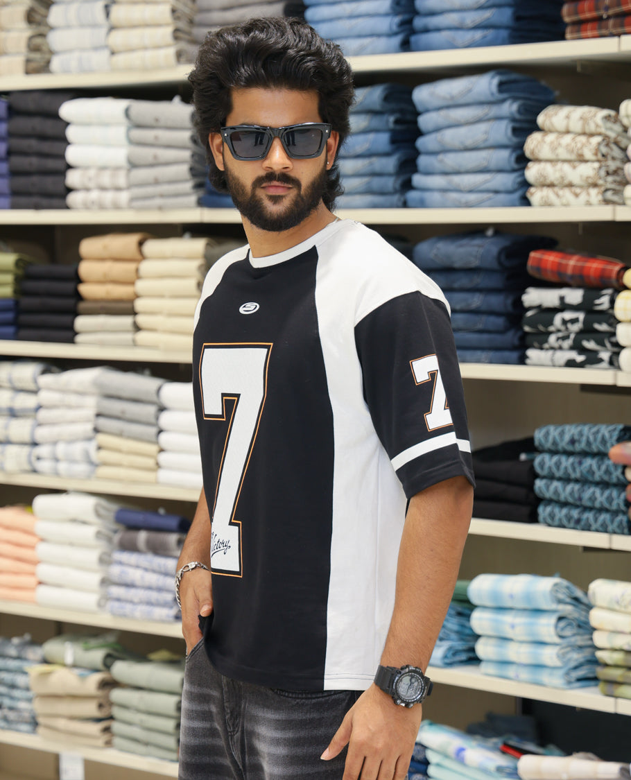 Black Cotton-Blended Oversized Printed Jersey-Style T-shirt Comes with Half-Sleeves, Round Neck, and Regular Length 
