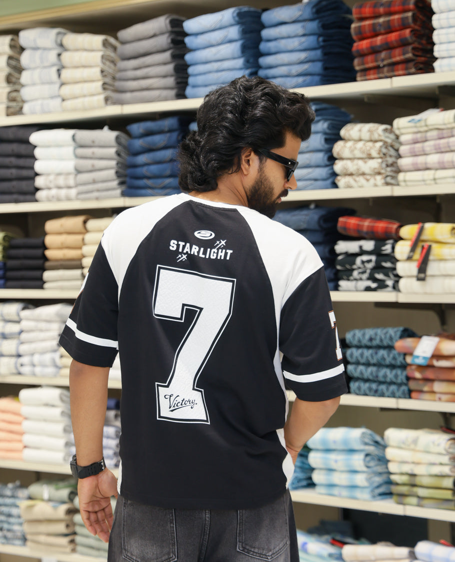 Black Cotton-Blended Oversized Printed Jersey-Style T-shirt Comes with Half-Sleeves, Round Neck, and Regular Length 