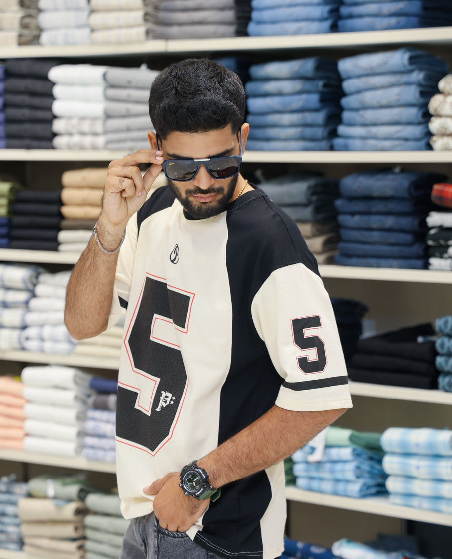 Cream Cotton-Blended Oversized Printed Jersey-Style T-shirt Comes with Half-Sleeves, Round Neck, and Regular Length 