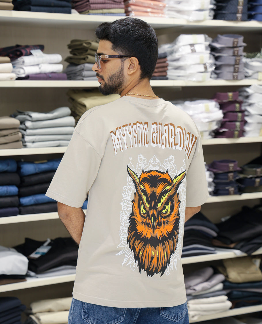 Cream Cotton-Blended T-shirt Features Funky and Bold Motifs Print, Half-Sleeves, Oversized Fit, Round Neck, and Regular Length