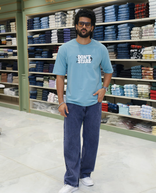 Teal Cotton-Blended T-shirt Features Funky and Bold Motifs Print, Half-Sleeves, Oversized Fit, Round Neck, and Regular Length 