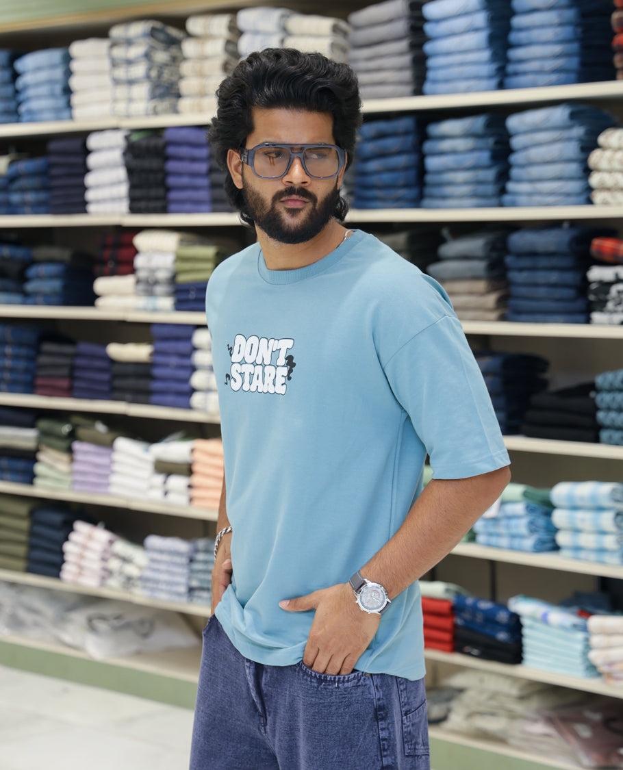 Teal Cotton-Blended T-shirt Features Funky and Bold Motifs Print, Half-Sleeves, Oversized Fit, Round Neck, and Regular Length